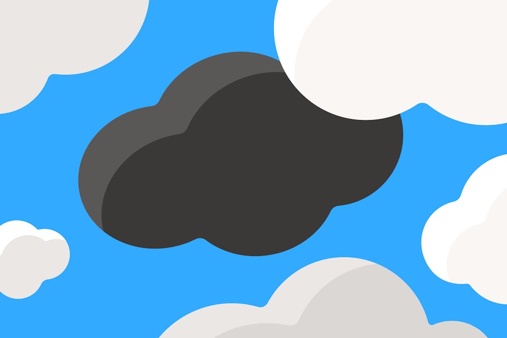 Dark cloud against blue sky background